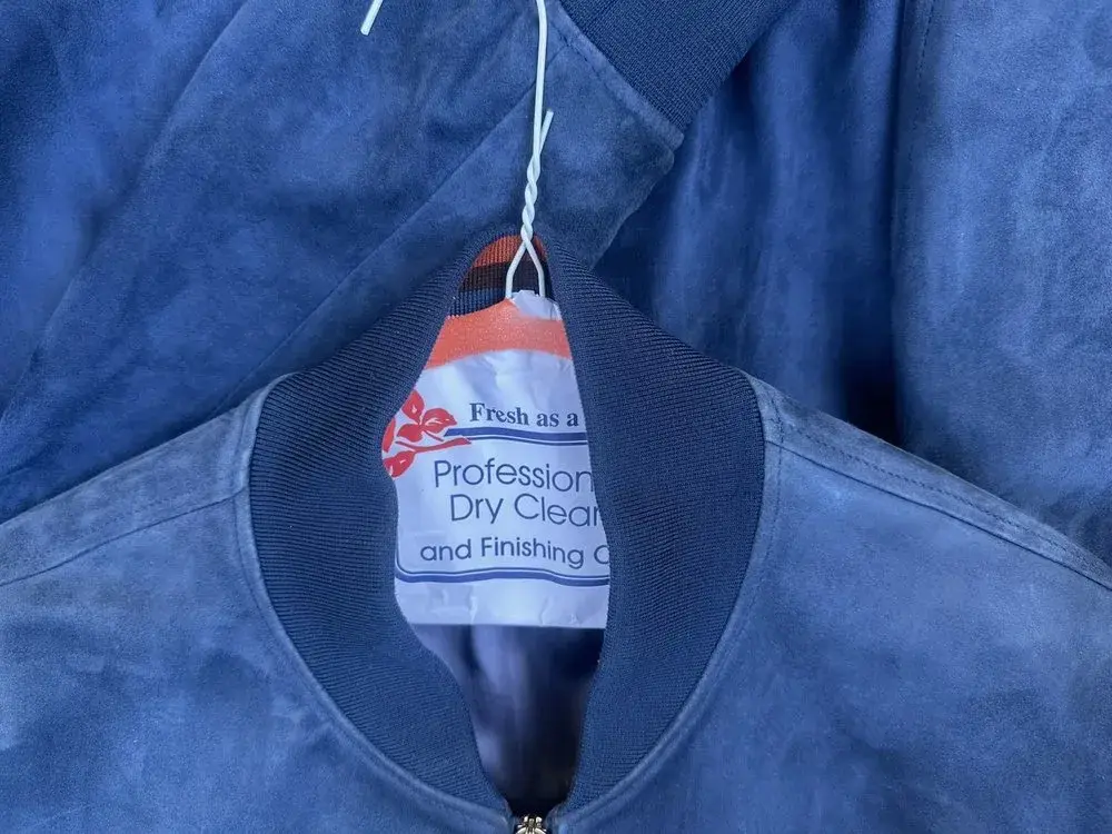 Paul Smith blue suede jacket after professional suede cleaning at Baroni Cleaners